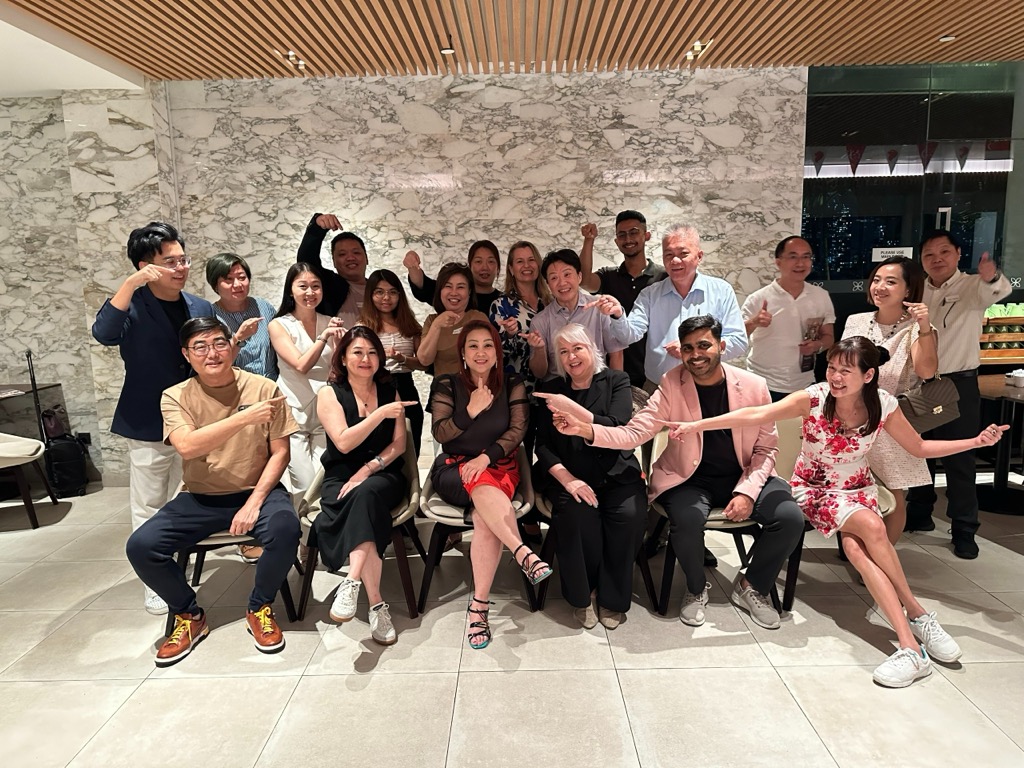 Members of The ONE Club at a monthly networking gathering